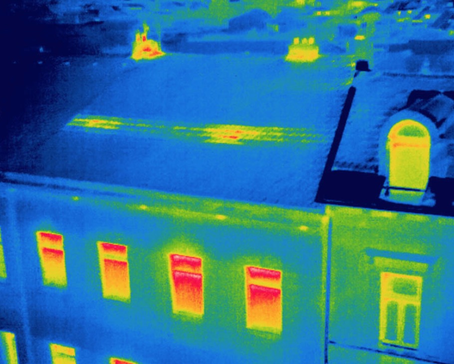 Thermal image showing heat loss from a building