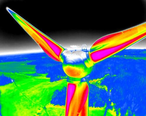 Drone inspecting a wind turbine