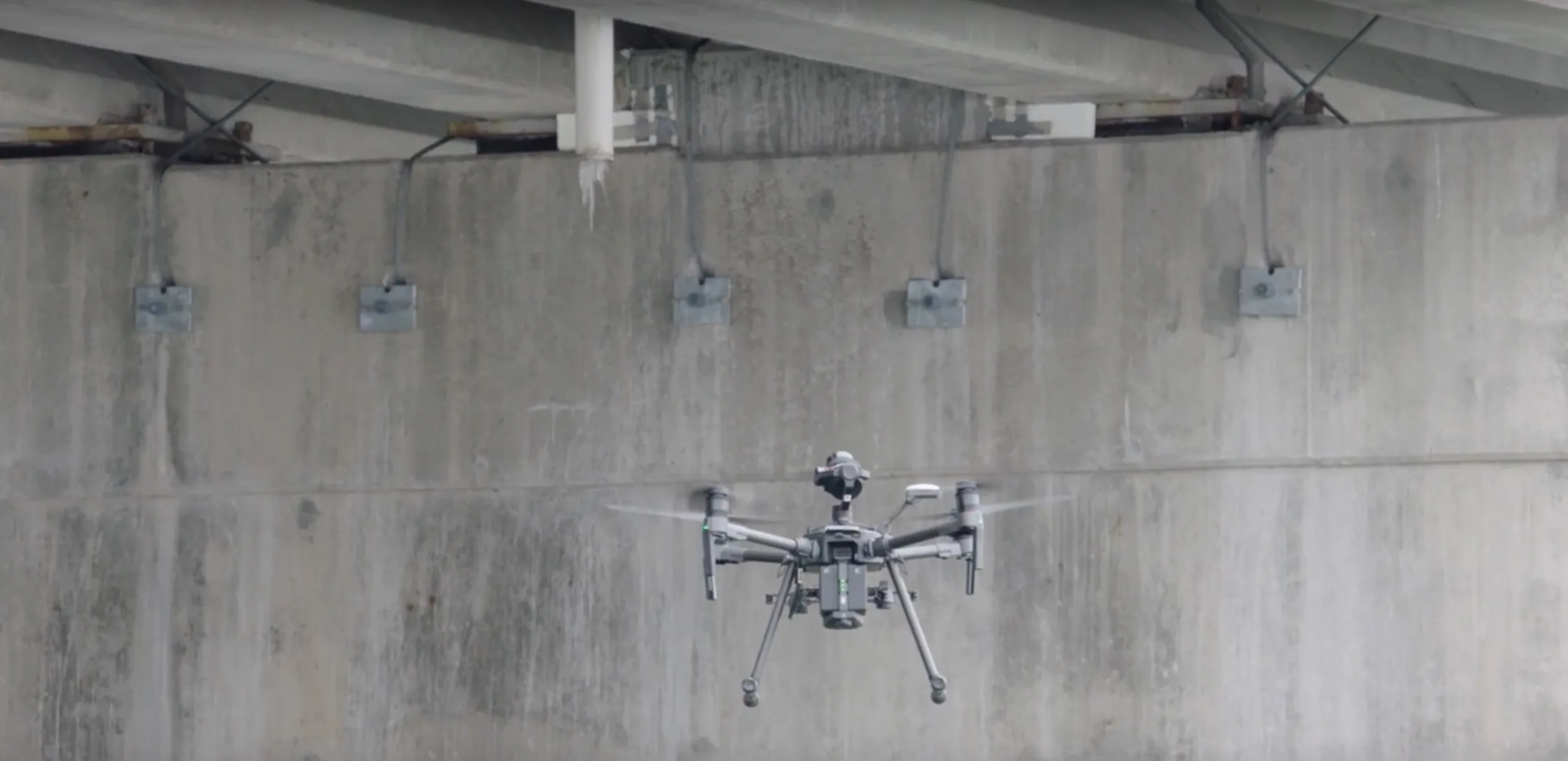 Drone inspecting the underside of a viaduct