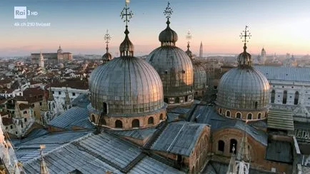 Domes of a basilica in a city of art seen from a drone